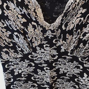 Vintage Black top with silver lace floral overlay.